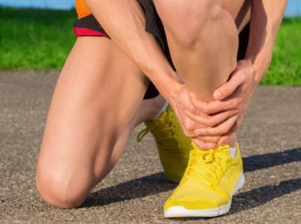 man with shin pain after running