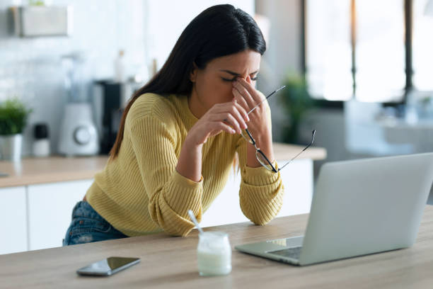 stressed woman working from home